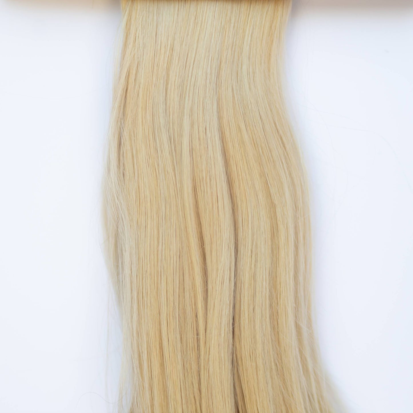 Machine-Tied Weft 28" 180g Pro Blend Hair Extensions - #22 Southern Belle Blonde (aka Light Ash Blonde)